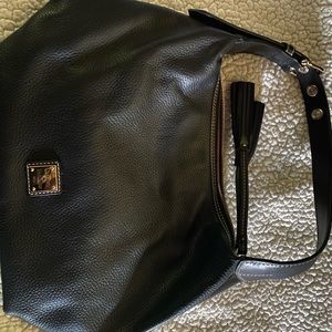 NWOT Dooney & Bourke black leather shoulder bag w/dust bag. Never carried.